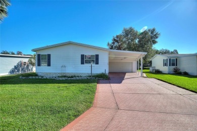 Discover Your Dream Home on Golden Pond: A Perfect Blend of on Polo Park Golf Course in Florida - for sale on GolfHomes.com, golf home, golf lot