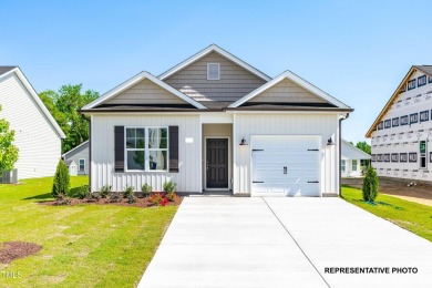 Premium lot! You will love this beautiful ranch new construction on Riverwood Golf and Athletic Club in North Carolina - for sale on GolfHomes.com, golf home, golf lot