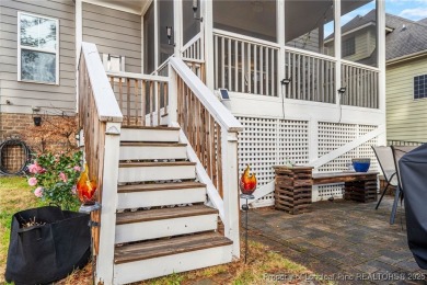 This stunning three-story, four-bedroom, 2.5-bath home in the on Anderson Creek Golf Club in North Carolina - for sale on GolfHomes.com, golf home, golf lot