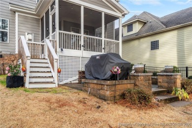 This stunning three-story, four-bedroom, 2.5-bath home in the on Anderson Creek Golf Club in North Carolina - for sale on GolfHomes.com, golf home, golf lot