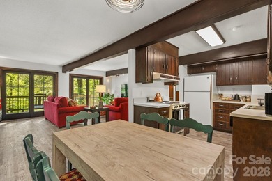 Lakefront living with both water and mountain views! Tucked away on Rumbling Bald Resort on Lake Lure in North Carolina - for sale on GolfHomes.com, golf home, golf lot