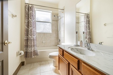 THIS HOME WILL BE GETTING A NEW ROOF PRIOR TO CLOSING! This on Tampa Bay Golf and Country Club in Florida - for sale on GolfHomes.com, golf home, golf lot