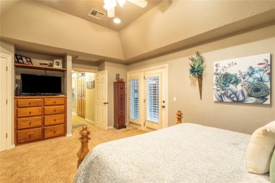 Welcome to your dream home! Nestled on an expansive corner lot on Elk City Golf and Country Club in Oklahoma - for sale on GolfHomes.com, golf home, golf lot