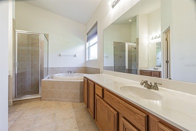 THIS HOME WILL BE GETTING A NEW ROOF PRIOR TO CLOSING! This on Tampa Bay Golf and Country Club in Florida - for sale on GolfHomes.com, golf home, golf lot