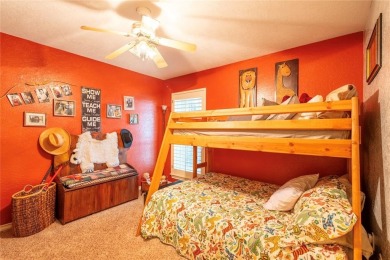 Welcome to your dream home! Nestled on an expansive corner lot on Elk City Golf and Country Club in Oklahoma - for sale on GolfHomes.com, golf home, golf lot