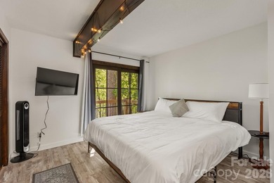 Lakefront living with both water and mountain views! Tucked away on Rumbling Bald Resort on Lake Lure in North Carolina - for sale on GolfHomes.com, golf home, golf lot