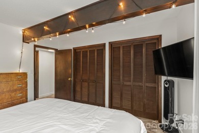 Lakefront living with both water and mountain views! Tucked away on Rumbling Bald Resort on Lake Lure in North Carolina - for sale on GolfHomes.com, golf home, golf lot