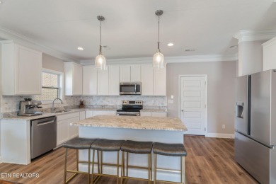 Welcome to this beautifully maintained all-brick END UNIT on The Preserve 9 Hole Golf Course in Tennessee - for sale on GolfHomes.com, golf home, golf lot