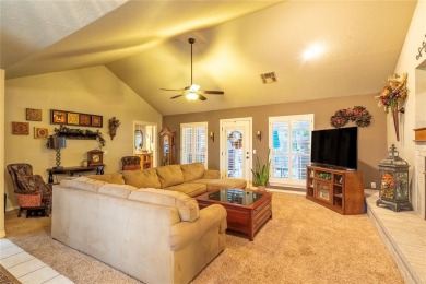 Welcome to your dream home! Nestled on an expansive corner lot on Elk City Golf and Country Club in Oklahoma - for sale on GolfHomes.com, golf home, golf lot
