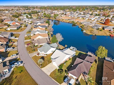 Live lakefront at Leisure Lake, a coveted Foley community where on Glenlakes Golf Club in Alabama - for sale on GolfHomes.com, golf home, golf lot