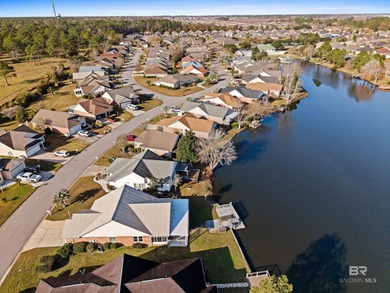 Live lakefront at Leisure Lake, a coveted Foley community where on Glenlakes Golf Club in Alabama - for sale on GolfHomes.com, golf home, golf lot