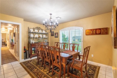 Welcome to your dream home! Nestled on an expansive corner lot on Elk City Golf and Country Club in Oklahoma - for sale on GolfHomes.com, golf home, golf lot