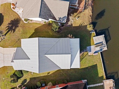 Live lakefront at Leisure Lake, a coveted Foley community where on Glenlakes Golf Club in Alabama - for sale on GolfHomes.com, golf home, golf lot