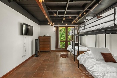 Lakefront living with both water and mountain views! Tucked away on Rumbling Bald Resort on Lake Lure in North Carolina - for sale on GolfHomes.com, golf home, golf lot