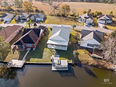 Live lakefront at Leisure Lake, a coveted Foley community where on Glenlakes Golf Club in Alabama - for sale on GolfHomes.com, golf home, golf lot