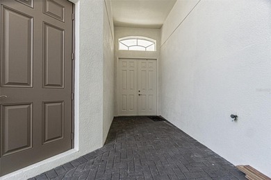 THIS HOME WILL BE GETTING A NEW ROOF PRIOR TO CLOSING! This on Tampa Bay Golf and Country Club in Florida - for sale on GolfHomes.com, golf home, golf lot