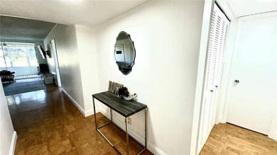 Beautifully updated unit featuring a breathtaking golf course on Palm-Aire Country Club and Resort - Palms in Florida - for sale on GolfHomes.com, golf home, golf lot