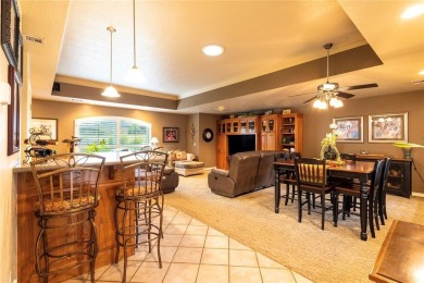 Welcome to your dream home! Nestled on an expansive corner lot on Elk City Golf and Country Club in Oklahoma - for sale on GolfHomes.com, golf home, golf lot