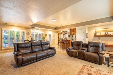 Welcome to your dream home! Nestled on an expansive corner lot on Elk City Golf and Country Club in Oklahoma - for sale on GolfHomes.com, golf home, golf lot