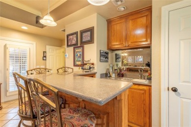 Welcome to your dream home! Nestled on an expansive corner lot on Elk City Golf and Country Club in Oklahoma - for sale on GolfHomes.com, golf home, golf lot
