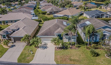 THIS HOME WILL BE GETTING A NEW ROOF PRIOR TO CLOSING! This on Tampa Bay Golf and Country Club in Florida - for sale on GolfHomes.com, golf home, golf lot