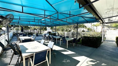 Beautifully updated unit featuring a breathtaking golf course on Palm-Aire Country Club and Resort - Palms in Florida - for sale on GolfHomes.com, golf home, golf lot