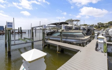 Welcome to a Boaters Paradise!! This Dolphin Point 2-bedroom 2 on Sandpiper Cove Golf Course in Florida - for sale on GolfHomes.com, golf home, golf lot