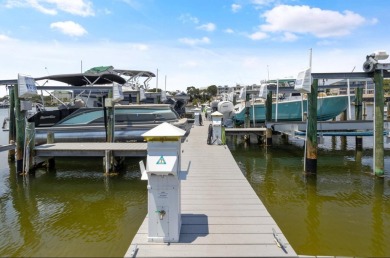 Welcome to a Boaters Paradise!! This Dolphin Point 2-bedroom 2 on Sandpiper Cove Golf Course in Florida - for sale on GolfHomes.com, golf home, golf lot