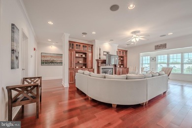 Resort-style living at its finest in this quiet, top-floor end on The Peninsula Golf and Country Club in Delaware - for sale on GolfHomes.com, golf home, golf lot