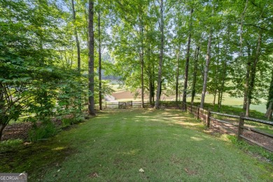 Amazing views of the Eagle Watch GOLF COURSE, tranquil POND on Canongate At Eagle Watch Golf Club in Georgia - for sale on GolfHomes.com, golf home, golf lot