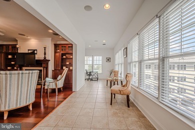 Resort-style living at its finest in this quiet, top-floor end on The Peninsula Golf and Country Club in Delaware - for sale on GolfHomes.com, golf home, golf lot