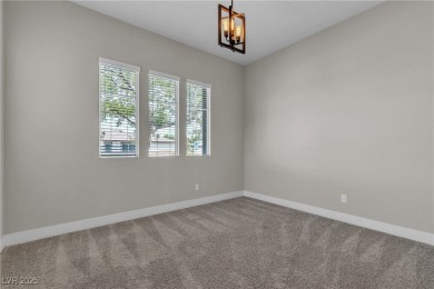 This charming one-story home sits on the golf course with views on Mountain Falls Golf Course in Nevada - for sale on GolfHomes.com, golf home, golf lot