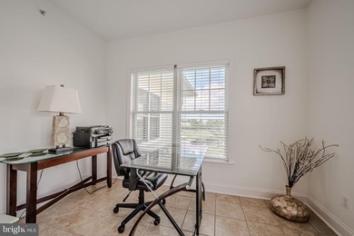 Resort-style living at its finest in this quiet, top-floor end on The Peninsula Golf and Country Club in Delaware - for sale on GolfHomes.com, golf home, golf lot