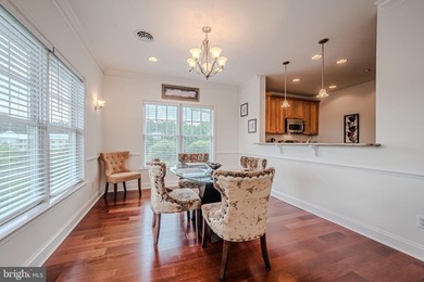 Resort-style living at its finest in this quiet, top-floor end on The Peninsula Golf and Country Club in Delaware - for sale on GolfHomes.com, golf home, golf lot