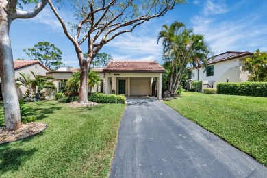 This remodeled two-story villa is a must-see. It's been on Boca Lago Golf and Country Club in Florida - for sale on GolfHomes.com, golf home, golf lot