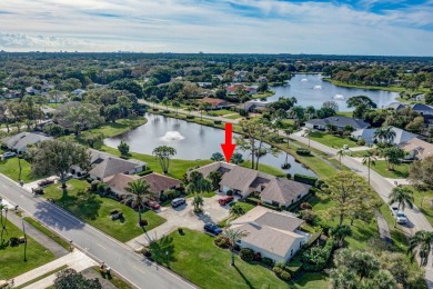 As you enter this exceptional 3/2 villa,you are immediately on Eastpointe Country Club in Florida - for sale on GolfHomes.com, golf home, golf lot