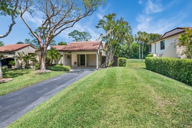 This remodeled two-story villa is a must-see. It's been on Boca Lago Golf and Country Club in Florida - for sale on GolfHomes.com, golf home, golf lot