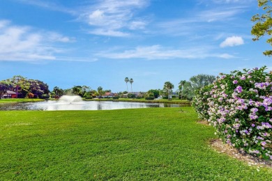 As you enter this exceptional 3/2 villa,you are immediately on Eastpointe Country Club in Florida - for sale on GolfHomes.com, golf home, golf lot