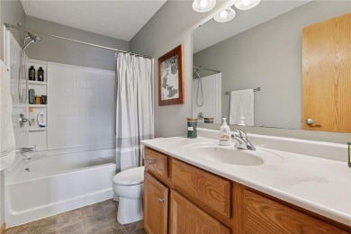 Welcome home to this spacious and well-maintained 3-bedroom on Boulder Pointe Golf Club in Minnesota - for sale on GolfHomes.com, golf home, golf lot