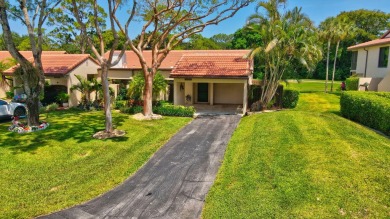 This remodeled two-story villa is a must-see. It's been on Boca Lago Golf and Country Club in Florida - for sale on GolfHomes.com, golf home, golf lot