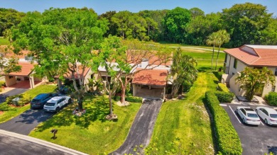 This remodeled two-story villa is a must-see. It's been on Boca Lago Golf and Country Club in Florida - for sale on GolfHomes.com, golf home, golf lot