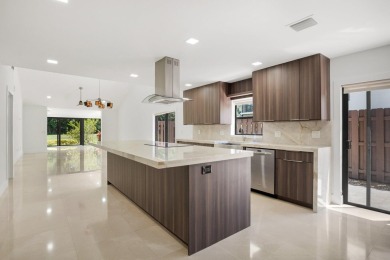 This remodeled two-story villa is a must-see. It's been on Boca Lago Golf and Country Club in Florida - for sale on GolfHomes.com, golf home, golf lot