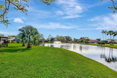 As you enter this exceptional 3/2 villa,you are immediately on Eastpointe Country Club in Florida - for sale on GolfHomes.com, golf home, golf lot