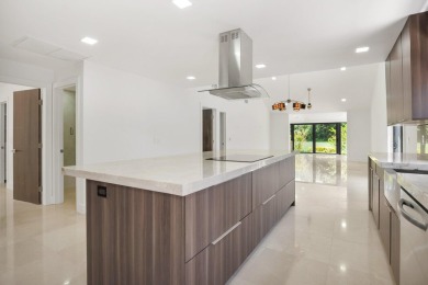 This remodeled two-story villa is a must-see. It's been on Boca Lago Golf and Country Club in Florida - for sale on GolfHomes.com, golf home, golf lot