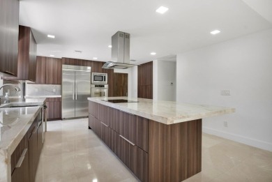 This remodeled two-story villa is a must-see. It's been on Boca Lago Golf and Country Club in Florida - for sale on GolfHomes.com, golf home, golf lot