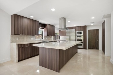 This remodeled two-story villa is a must-see. It's been on Boca Lago Golf and Country Club in Florida - for sale on GolfHomes.com, golf home, golf lot