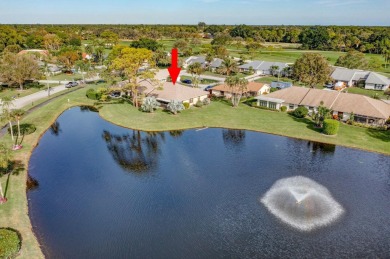 As you enter this exceptional 3/2 villa,you are immediately on Eastpointe Country Club in Florida - for sale on GolfHomes.com, golf home, golf lot