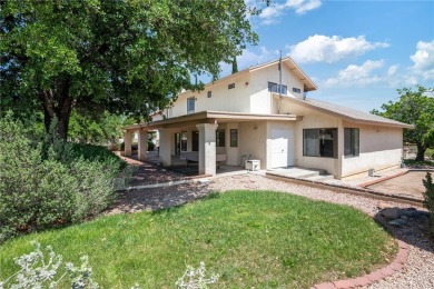This 3285 livable sq. ft home backs up to the sceni 3rd hole of on Cerbat Cliffs Golf Course in Arizona - for sale on GolfHomes.com, golf home, golf lot