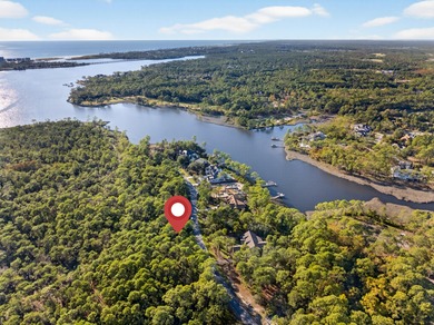 Build your dream home or vacation retreat on this spacious and on Sharks Tooth Golf Club in Florida - for sale on GolfHomes.com, golf home, golf lot