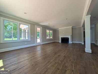 A golfer's paradise! This 4-bedroom, 3-bathroom home with 9' on Indian Creek Golf Club in Georgia - for sale on GolfHomes.com, golf home, golf lot